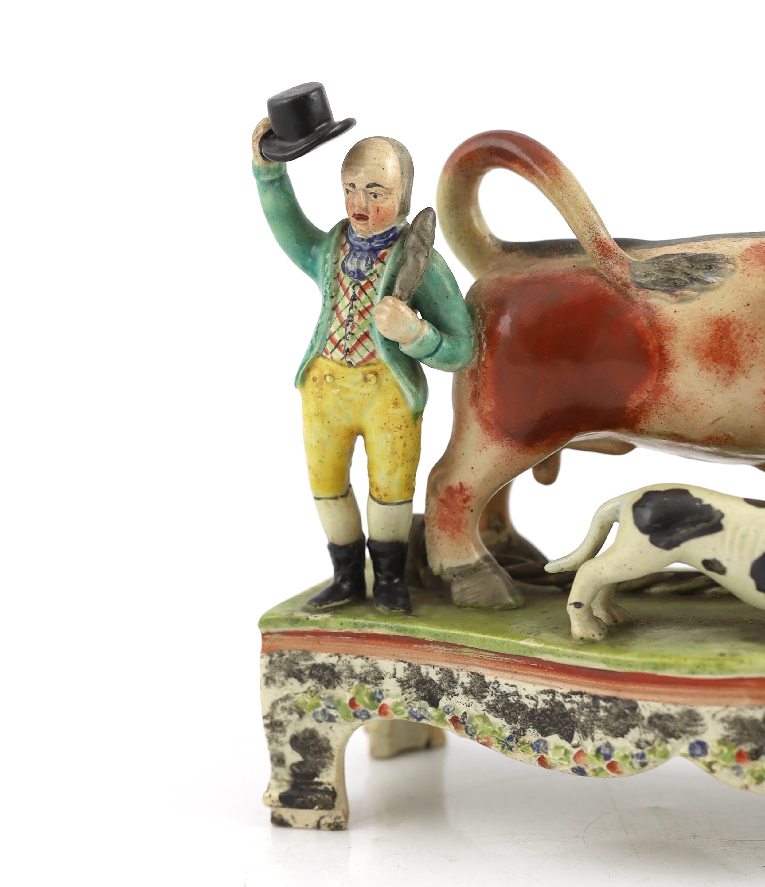 A Staffordshire pearlware bull baiting group, of Obadiah Sherratt type, c.1830, Some restoration